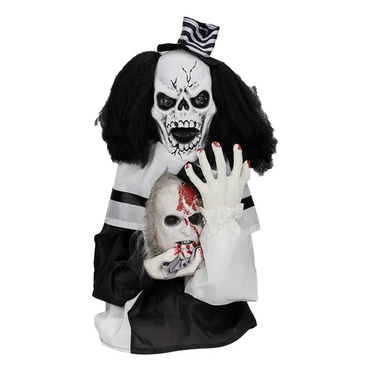 Sound-activated clown Halloween prop with glowing red LED eyes — mid-bounce